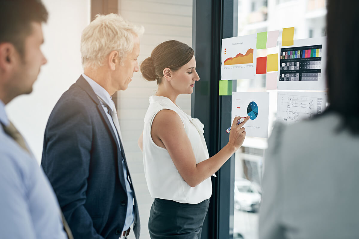 red-brainstorming-glass-wall-team-business-people-with-chart-stats-risk-management-analysis-presentation-group-solution-graph-financial-data-training-planning-office-meeting